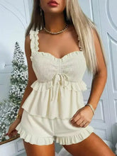Ruffled smocked cream romper with ruffled shorts set