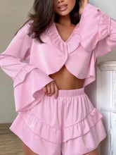Pink satin ruffled V-neck crop top and tiered shorts set