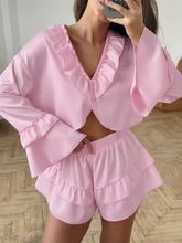 Pink satin ruffled V-neck top and shorts loungewear set