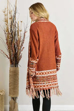 Rust long Aztec border cardigan with fringe hem for women