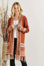 Women’s rust long aztec border cardigan with fringe hem