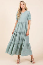 Sage green textured short sleeve tiered maxi dress with puff sleeves