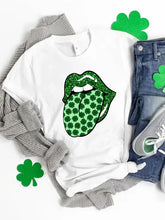 Saint Patricks Day round neck t-shirt with glittery green lips and shamrock tongue