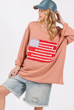 Pink drop shoulder top with American flag patch and distressed seams