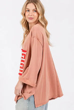 Salmon drop shoulder top with American flag patch and distressed seams