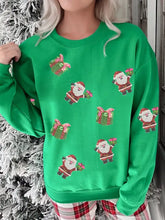 Green christmas sweatshirt with embroidered santa and gifts featuring glittery accents machine wash cold recommended