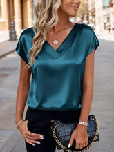 Teal satin v-neck cap sleeve blouse with short sleeves designed for elegant and comfortable wear