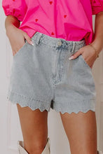 Light wash scalloped hem denim shorts with detailed edging