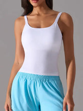 White scoop neck active tank with detachable chest pads and thin straps