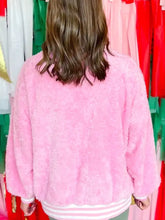 Pink fluffy sequin chenille merry graphic plush sweatshirt with long sleeves and slightly stretchy cozy fabric