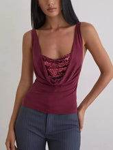 Maroon velvet tank with a sequin bodice and draped cowl neck designed as a ruched sleeveless top