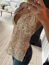 Beige halter neck cami with intricate gold and brown floral embroidery and sequin embellishments