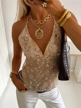Beige sequin embellished halter neck cami with intricate floral embroidery and a deep v-neckline design