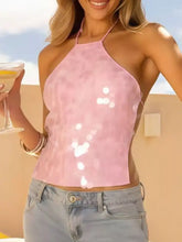 Pink sequin halter neck cami with a sheer shimmering texture featuring a stylish and elegant halter neck design