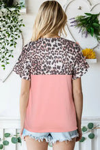 Sequin leopard round neck top with pink panel and black shorts