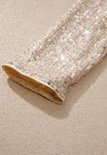 Champagne sequin long sleeve wrap bodysuit with gold trim