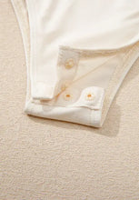 Sequin long sleeve wrap bodysuit with white button-down shirt and pearl buttons