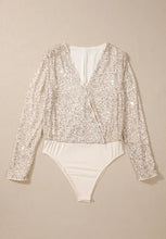 White sequin long sleeve wrap bodysuit with plunging neckline