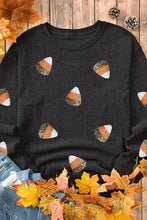 Black sequin round neck long sleeve sweatshirt with glittery candy corn graphics