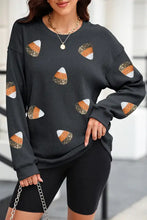 Sequin round neck long sleeve sweatshirt with sparkling candy corn graphics