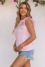 Sequin round neck sleeveless blouse with floral ruffles and denim shorts