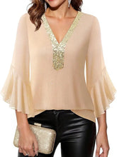 Beige sheer blouse with gold sequin v neck and flared neck flounce sleeves in a lightweight fabric