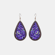 Sequin wood teardrop earrings with purple glitter center in dark wood frame