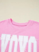 Pink cotton sequin xoxo letter graphic baggy sweatshirt with slightly stretchy fabric and lace outlined vivid lettering