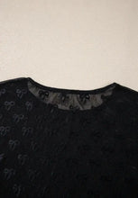 Sheer black mesh top with bow pattern and slightly stretchy floral lace