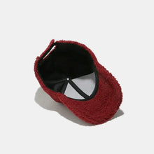 Red Sherpa Letter H Embroidered Cap with fuzzy red exterior and black underside