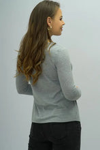 Shiny buttoned long sleeve round neck tee in gray with black jeans