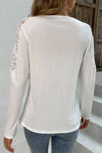 Shiny spliced lace notched neck top with white long-sleeved design and shoulder lace inserts