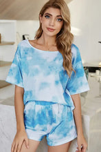 Blue and white shiny tie-dye boat neck top with short sleeve length paired with matching shorts lounge set