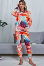 Shiny tie-dye crewneck top and drawstring waist joggers lounge set in orange blue and purple with long sleeve length in soft fabric