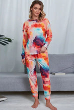 Vibrant shiny tie-dye crewneck top and drawstring waist joggers lounge set in soft flowing fabric with long sleeve length