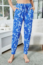 Blue and white shiny tie-dye drawstring waist joggers with pockets