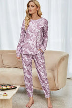 A soft lavender velour tie-dye loungewear set with long sleeve length top and tapered drawstring joggers