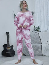 Pink and white shiny tie-dye round neck top and drawstring pants lounge set made of soft comfortable fabric