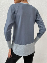 Two-tone blue and grey long sleeve length raglan sleeve tee