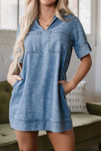 Light blue denim mini dress with short sleeves collar and two front patched pockets perfect for casual wear