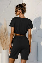 Black short sleeve cropped top and drawstring shorts lounge set with elastic waistband for comfortable casual wear