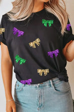 Black short sleeve sequin round neck t-shirt with colorful bow print