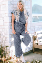 Gray quilted jumpsuit with geometric pattern and elastic waistband featuring short sleeve length lounge set design