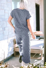 Gray quilted short sleeve top and pocketed pants lounge set with geometric triangle pattern and comfortable sleeve length