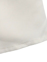 Close-up of smooth off-white Short Sleeve Top and Skirt Set fabric edge stitching