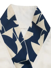 Navy blue and cream abstract leaf-patterned collar on Short Sleeve Top and Skirt Set