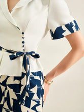 White and navy geometric peplum dress in Short Sleeve Top and Skirt Set