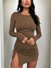Charcoal gray ruched bodycon mini dress with long sleeves and lace-up side slit