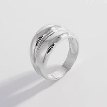 Silver bulging ring with layered dome design and polished finish