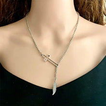 Silver cross chain necklace with feather and sunflower pendants